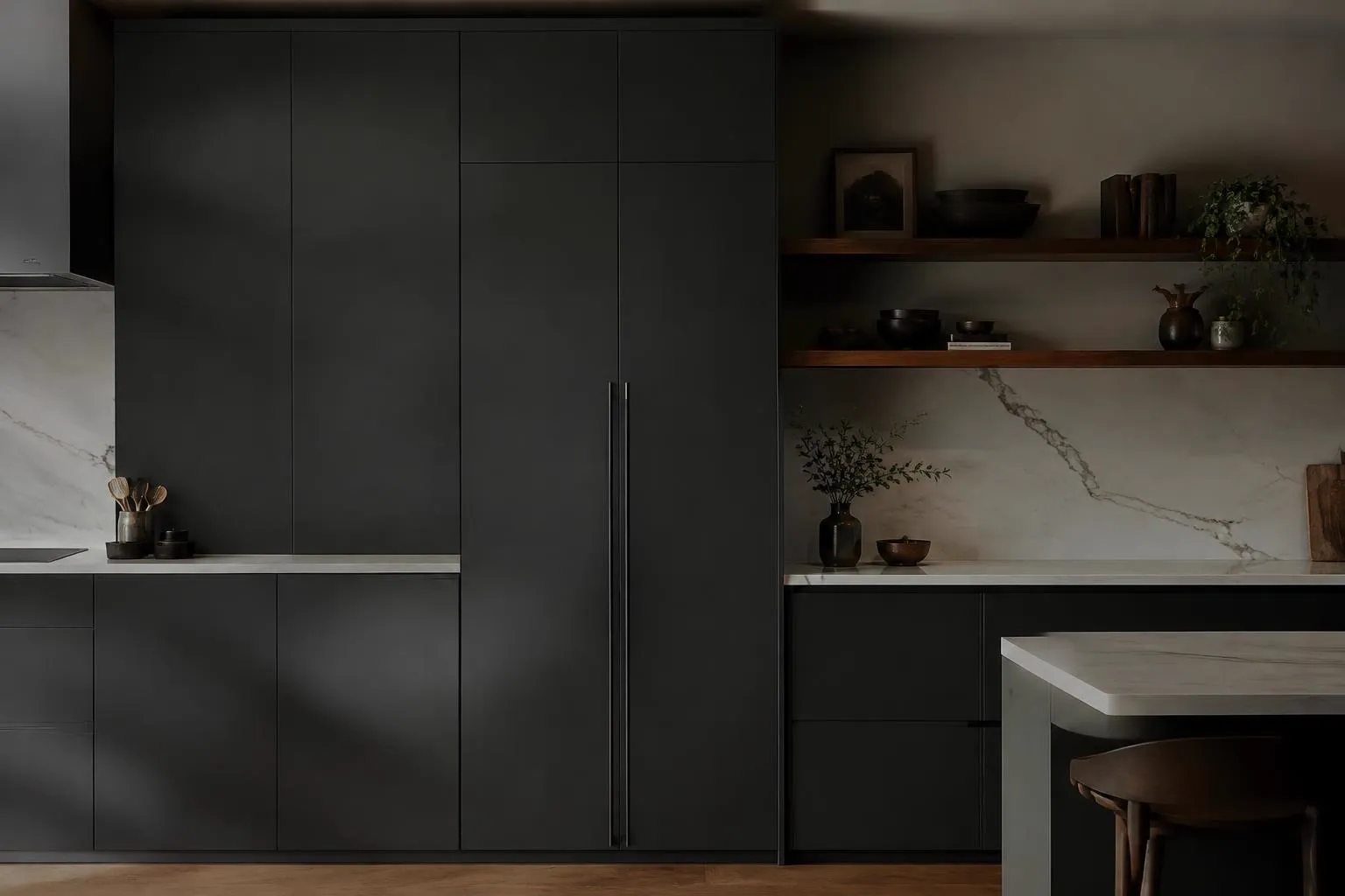 Matte charcoal tall kitchen cabinets with walnut shelves and white stone backsplash